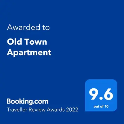 a screenshot of an old town appointment with the text upgraded to old town appointment at Old Town Apartment with FREE Parking in Marijampolė
