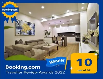 a picture of a living room and kitchen in a house at Europa Dream Apartment in Vilnius