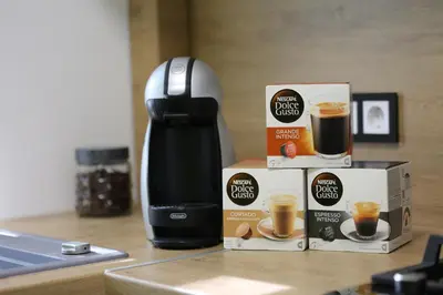 a coffee maker and some cups of coffee on a counter at Modern & Homely Apartment - FREE PARKING - NETFLIX in Kaunas