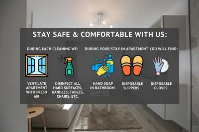 a room with a sign that says stay safe and comfortable with us at Modern & Homely Apartment - FREE PARKING - NETFLIX in Kaunas
