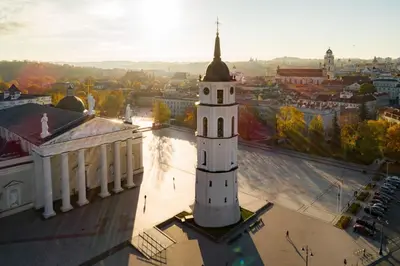 a clock tower on top of a building at Luxury Panoramic Vilnius apartment in Vilnius