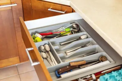 a drawer filled with utensils in a kitchen at #inVilnius - Spacious & Bright 1BDR Apartment Shopping District in Vilnius