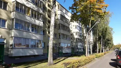 an apartment building on the side of a street at Tulpių apartamentai in Panevėžys