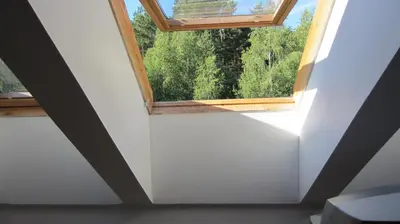 a window in a room with a white wall at VGH accommodation services in Vilnius