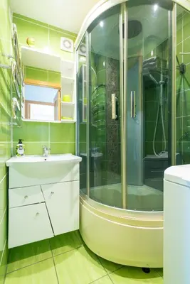 a bathroom with a shower and a sink at Du draugai 1 in Druskininkai