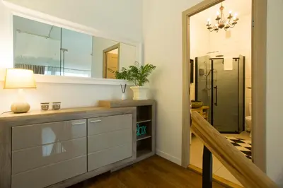 a bathroom with a sink and a mirror at Relax Birstonas in Birštonas