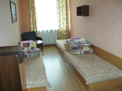 a hospital room with two beds with luggage on them at Apgyvendinimo įstaiga KORNEALITA-ZARASAI in Zarasai