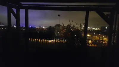 a view of a city skyline at night at Apartments Vilnius 1 near center with a roof terrace and parking in Vilnius