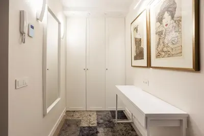 a white bathroom with a sink and a mirror at Luxury for everyone - Hills Park Lux Apartments 1 in Vilnius
