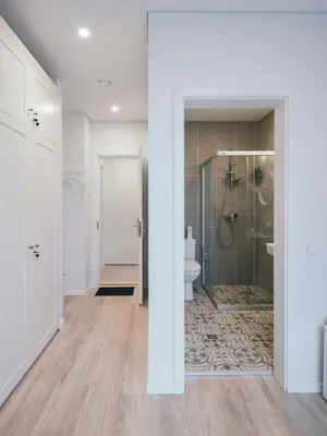 a bathroom with a shower and a toilet at J14A I Rooms & Apartments AUTOMATED SELF CHECK-IN in Vilnius