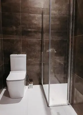 a bathroom with a shower and a toilet at Islandijos gatvė in Vilnius