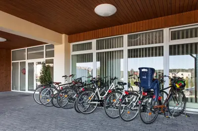 a row of bikes parked in front of a building at Mineraliniai Apartamentai in Druskininkai