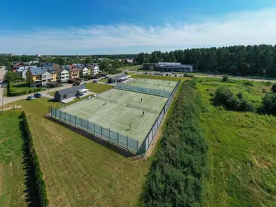 an overhead view of a tennis court in a field at Mineraliniai Apartamentai in Druskininkai