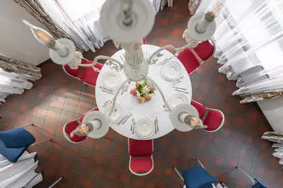 an overhead view of a table with a plate of food on it at BURMISTRO NAMAS in Druskininkai