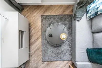 an overhead view of a living room with a table at City Center apartment by URBAN RENT in Vilnius