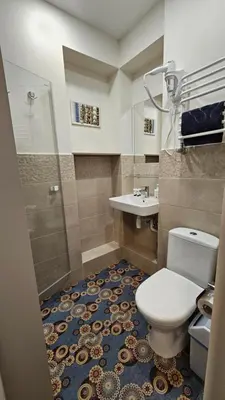 a bathroom with a toilet and a sink at Nileja in Vilnius