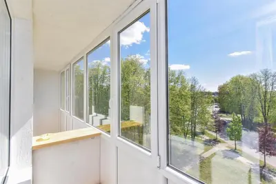 a room with a window with a view of a street at Crystal Apartment in Druskininkai