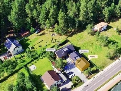 an aerial view of a house with a yard at Aušra in Druskininkai
