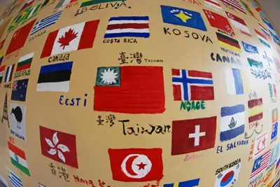 a ball with international flags on it at The Monk's Bunk Kaunas in Kaunas