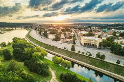 an aerial view of a city with a river at City Center Loft in Kaunas