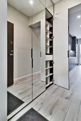 a walk in closet with a glass door at City Center Loft in Kaunas