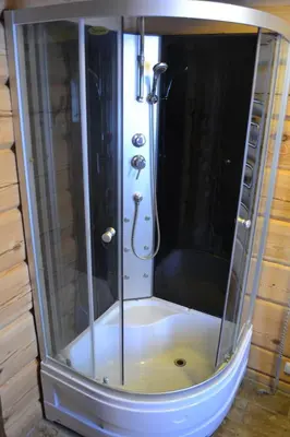 a shower with a glass door in a bathroom at sodyba 