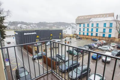 a view of a parking lot with cars parked at Bright 1BD Apartment in Old Town by Hostlovers in Kaunas
