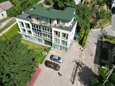 an overhead view of a house with a car in front at EVArent Apartament Free parking in Vilnius