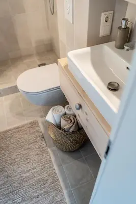 a bathroom with a toilet and a sink at Mai Ram Yoga House in Vilnius