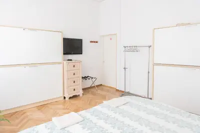 a bedroom with a bed and a basketball hoop at Hostel Liberty in Kaunas