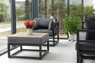 a living room with a couch and a coffee table at Lofts - Kaunas airport in Karmėlava