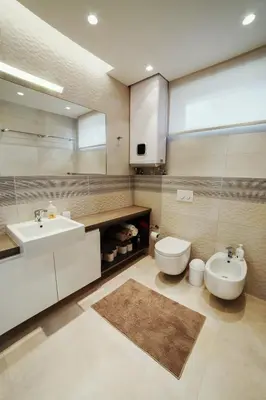 a bathroom with a sink and a toilet at Geras miegas in Druskininkai