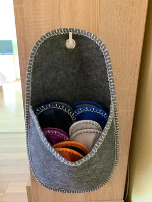 a drawer filled with different colored belts at Jaukus butas in Anykščiai