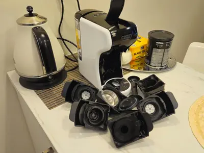 a counter with a coffee maker and a mixer on it at HaPPy INN Studio Historic center, Self check-in, AC, Parking in the undergrnd Garage, in Vilnius