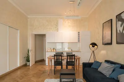 a living room with a couch and a table at M terrace in Kaunas