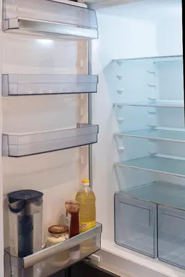 a refrigerator with its door open with food in it at HaPPy Inn Presidential, Self check-in, Parking in the underground garage in Vilnius