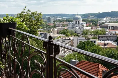 a view of a city from a balcony at Heritage Boutique 'Green Hill' in Kaunas
