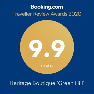 a yellow circle with the number on it at Heritage Boutique 'Green Hill' in Kaunas