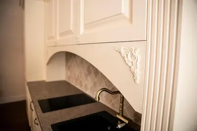 a kitchen with a counter with a sink at Heart of OLD TOWN - St. Ann apartment in Vilnius