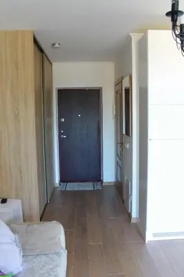 a room with a door and a room with a bed at Ruta Marija in Druskininkai