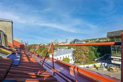 a view of a city from the balcony of a building at A. Vienuolio gatvė Apartamentai in Vilnius