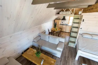 an overhead view of a living room and kitchen in a tiny house at Family house Vila Rica in Ricieliai