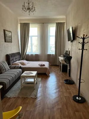 a living room with a couch and a table at Sija's house in Kaunas