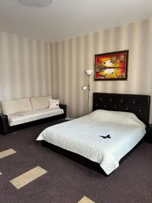 a bedroom with two beds in a room at Sija's house in Kaunas