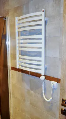 a window in a bathroom with a pipe on the wall at Apartments Franny's Bees in Vilnius