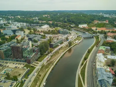 an aerial view of a city with a river at Vilnius city best view apartments in Vilnius