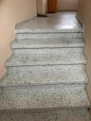 a set of stairs with speckles on them at Old Town apartment in Kaunas