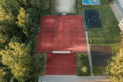 an overhead view of a tennis court with solar panels at Camping & Camper place Pasvalys in Pasvalys
