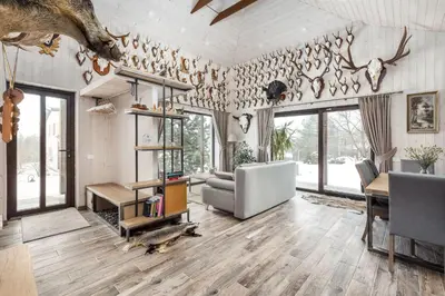 a living room with a couch and a table at Riese Apartments in Riese