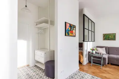 a living room with a couch and a table at Art & Comfort Home in Kaunas